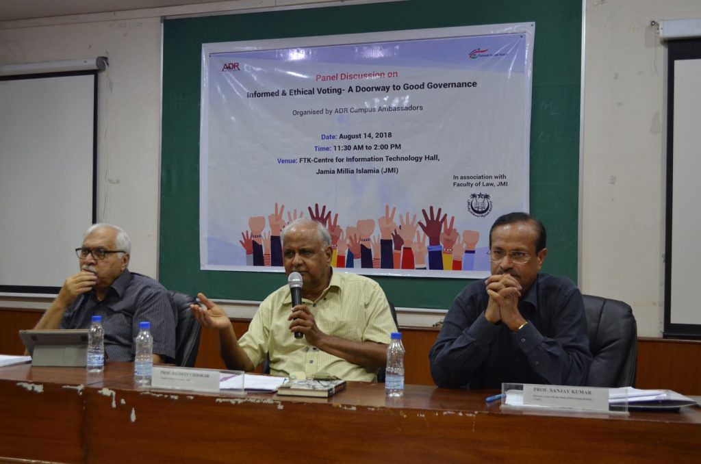 Professor Jagdeep Singh Chhokar speaking into a microphone at an ADR panel at Jamia Millia Islamia